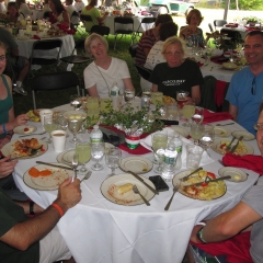 Team CBBC at Saturday dinner under the big top.